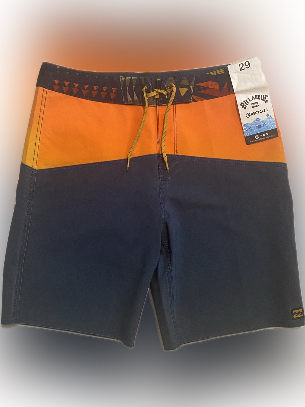 Billabong fifty 50 pro recycler board shorts, size 29, color blue and orange